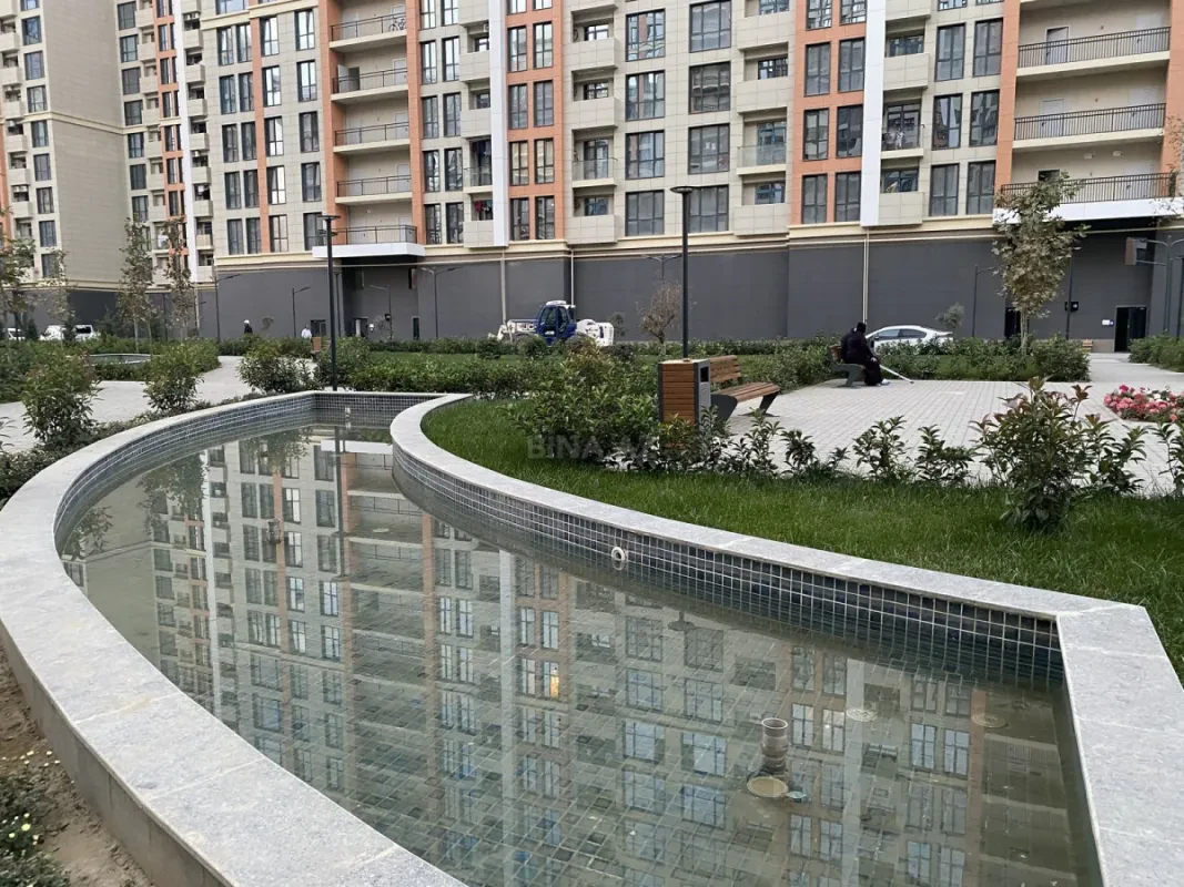 Satılır 4 otaqlı mənzil 121 m²
