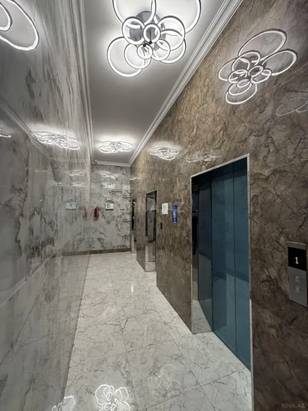 Satılır 4 otaqlı mənzil 164 m²