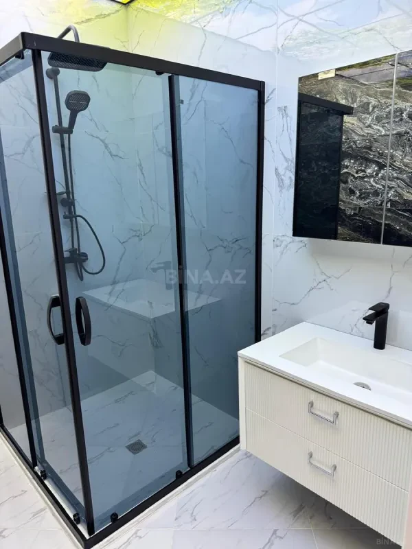 Satılır 4 otaqlı mənzil 153 m²
