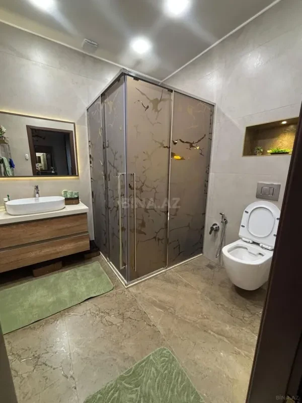 Satılır 4 otaqlı mənzil 165 m²
