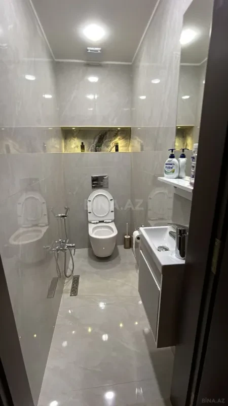 Satılır 4 otaqlı mənzil 165 m²
