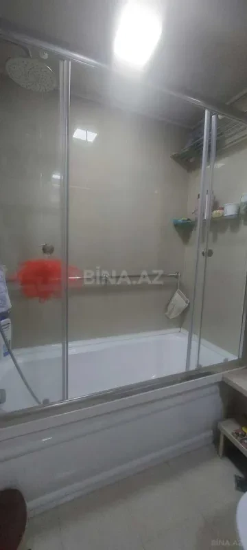 Satılır 4 otaqlı mənzil 142 m²