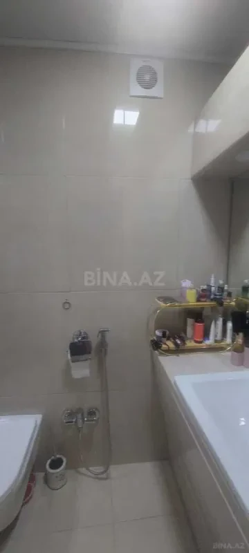 Satılır 4 otaqlı mənzil 142 m²