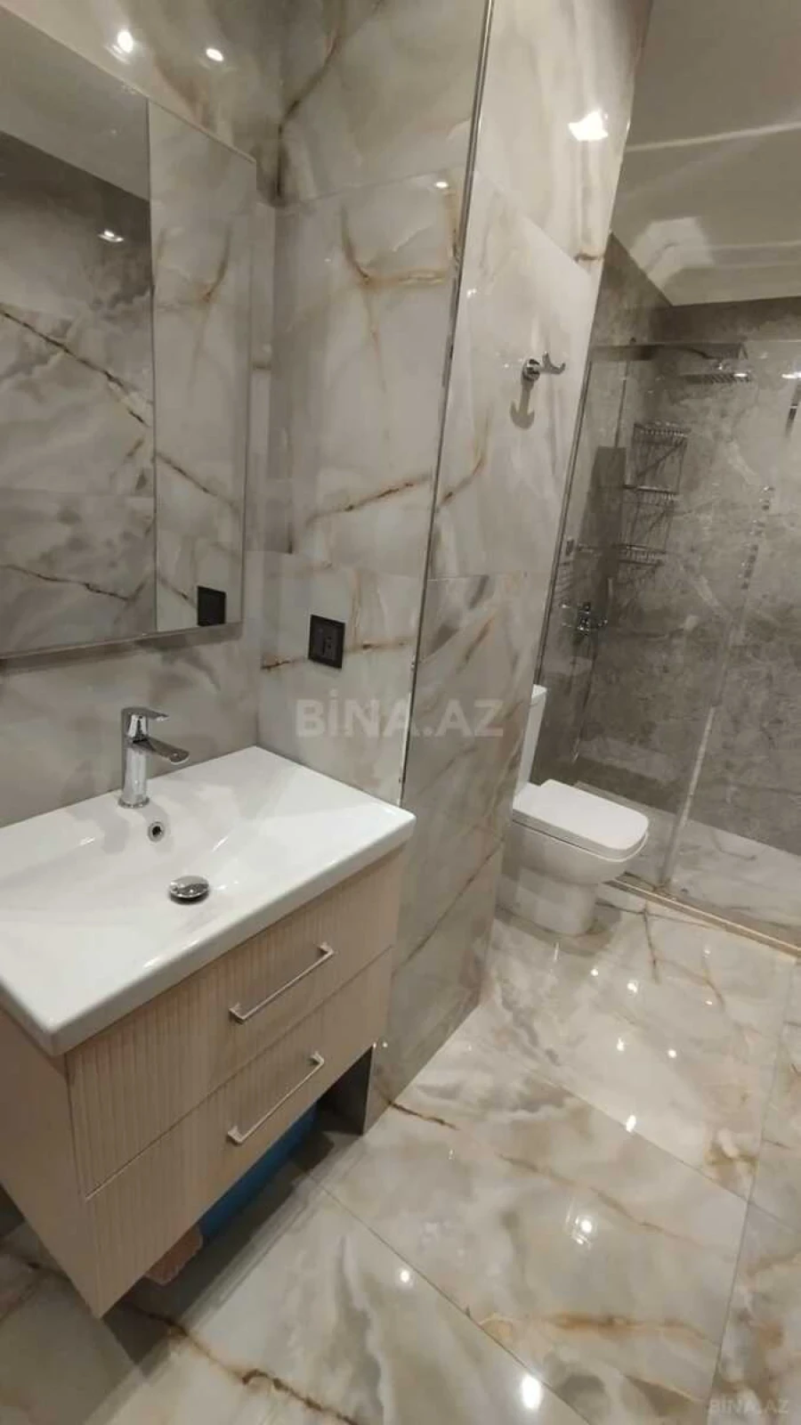 Satılır 4 otaqlı mənzil 155 m²