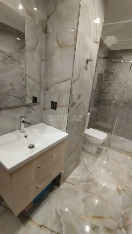 Satılır 4 otaqlı mənzil 155 m²