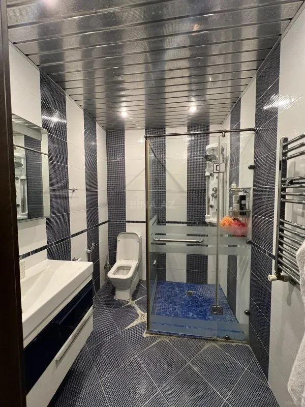 Satılır 3 otaqlı mənzil 141 m²