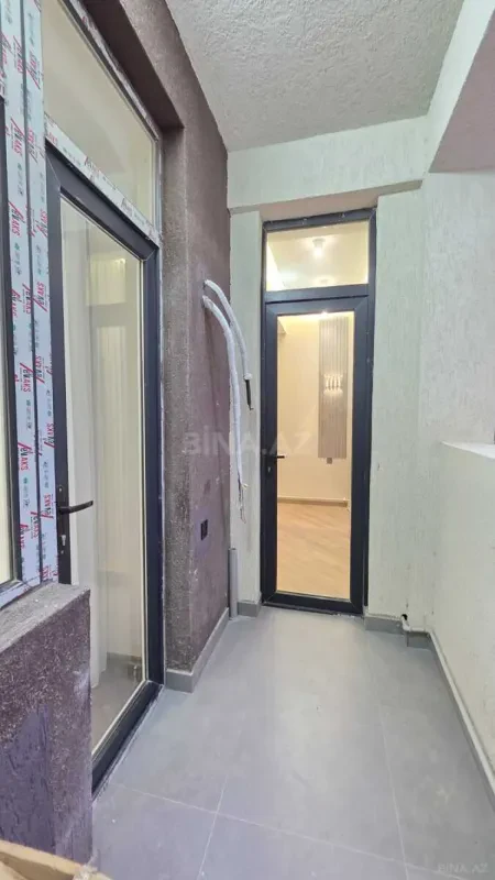 Satılır 2 otaqlı mənzil 56 m²