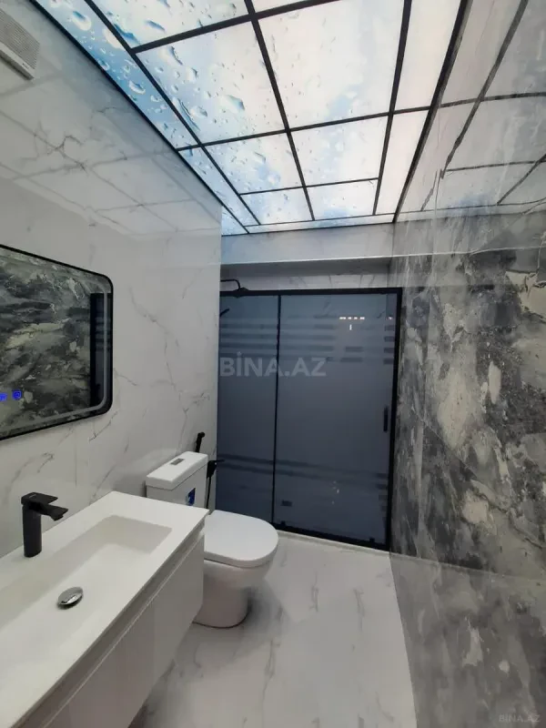 Satılır 4 otaqlı mənzil 155 m²