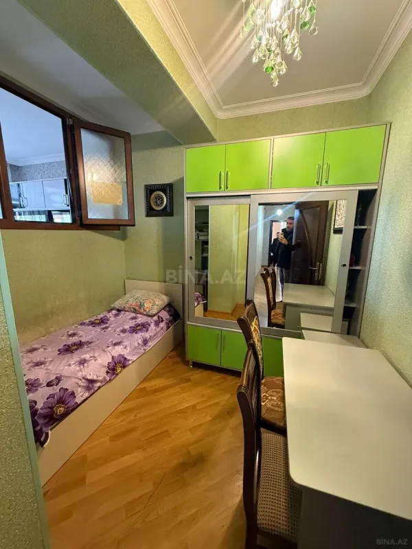 Satılır 4 otaqlı mənzil 122 m²