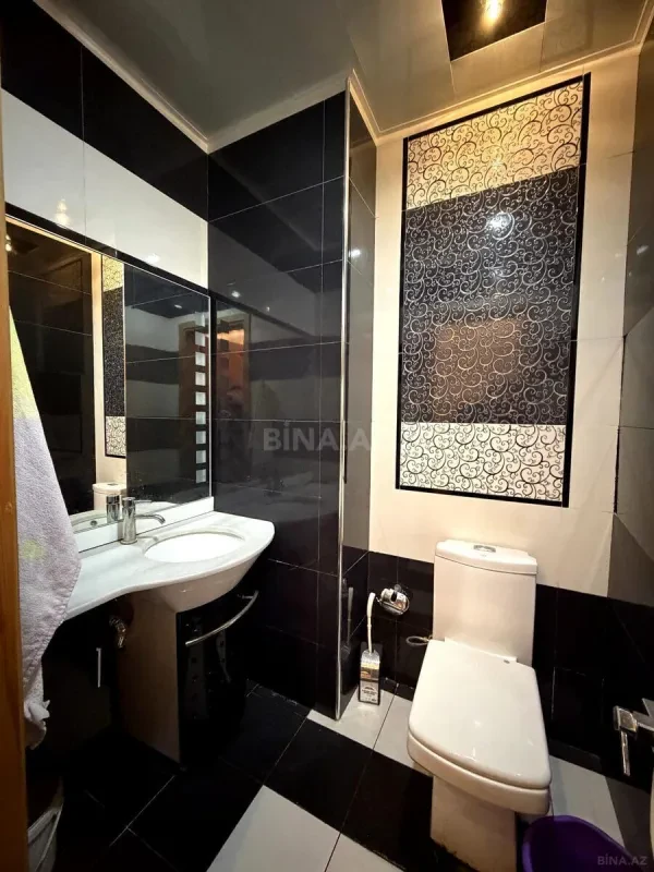 Satılır 4 otaqlı mənzil 218 m²