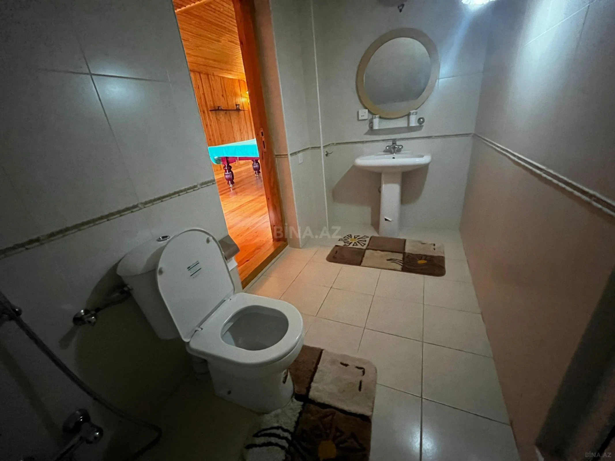 Satılır 9 otaqlı həyət evi 450 m²