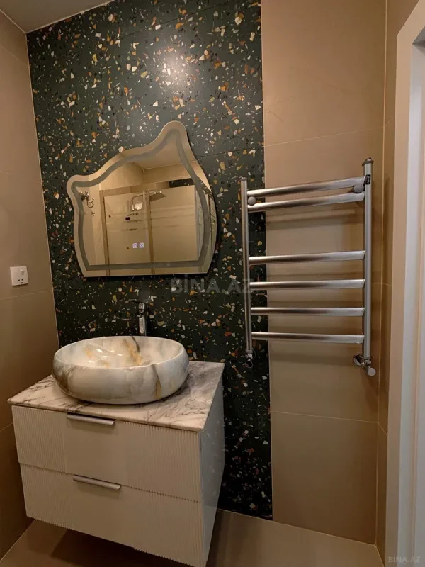 Satılır 2 otaqlı mənzil 64.5 m²
