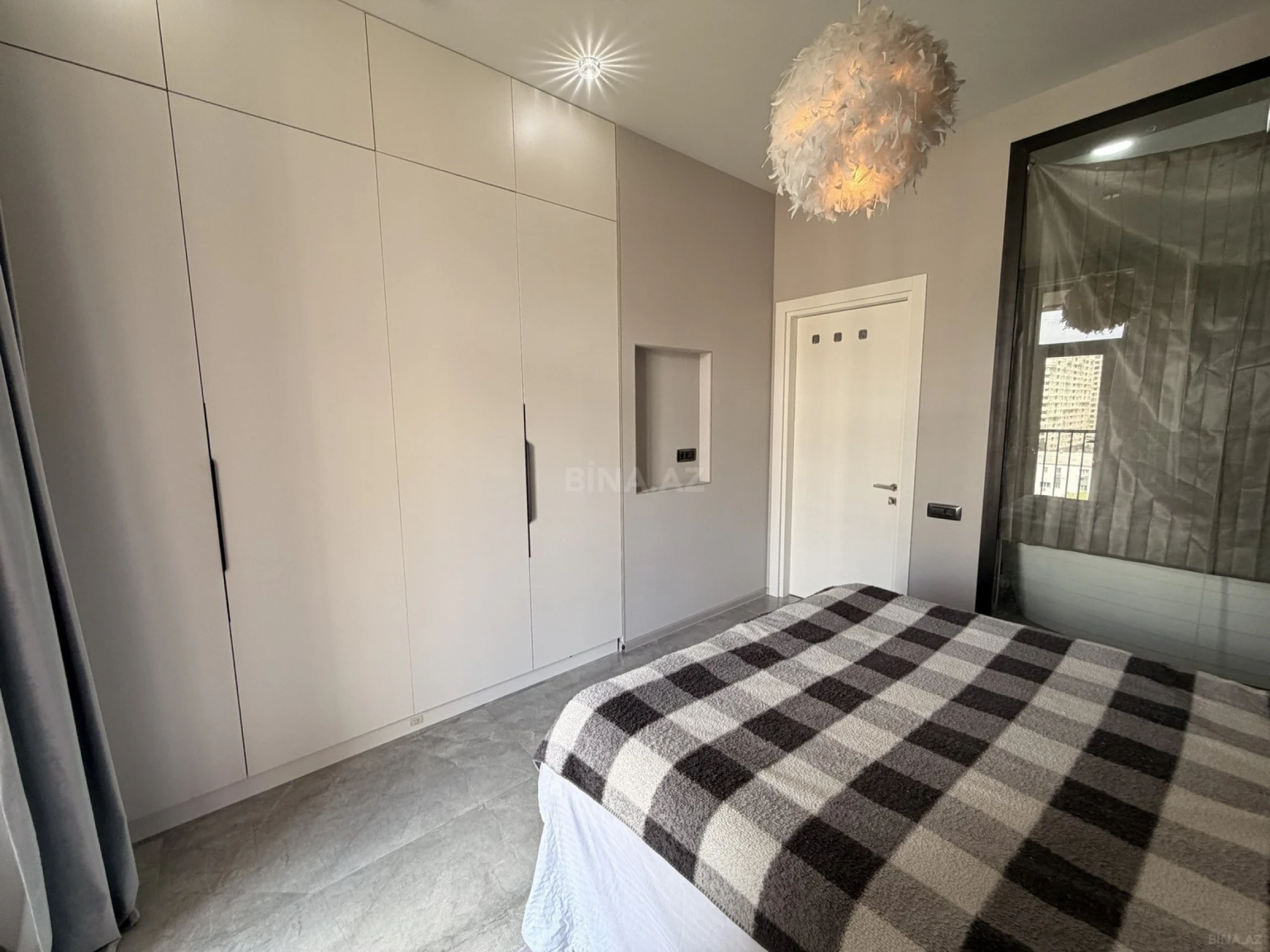 Satılır 2 otaqlı mənzil 103 m²