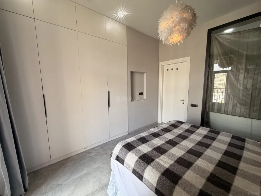 Satılır 2 otaqlı mənzil 103 m²