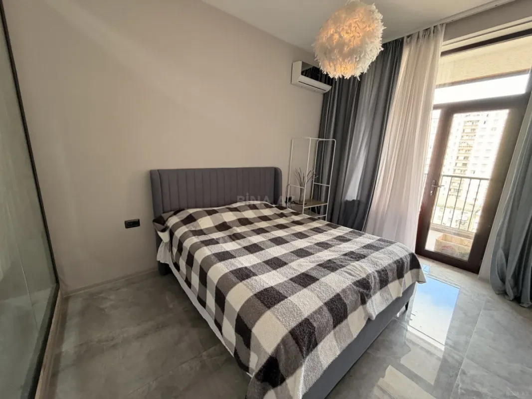 Satılır 2 otaqlı mənzil 103 m²