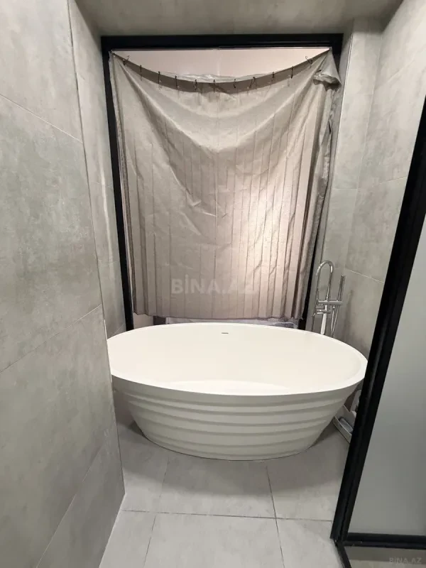 Satılır 2 otaqlı mənzil 103 m²