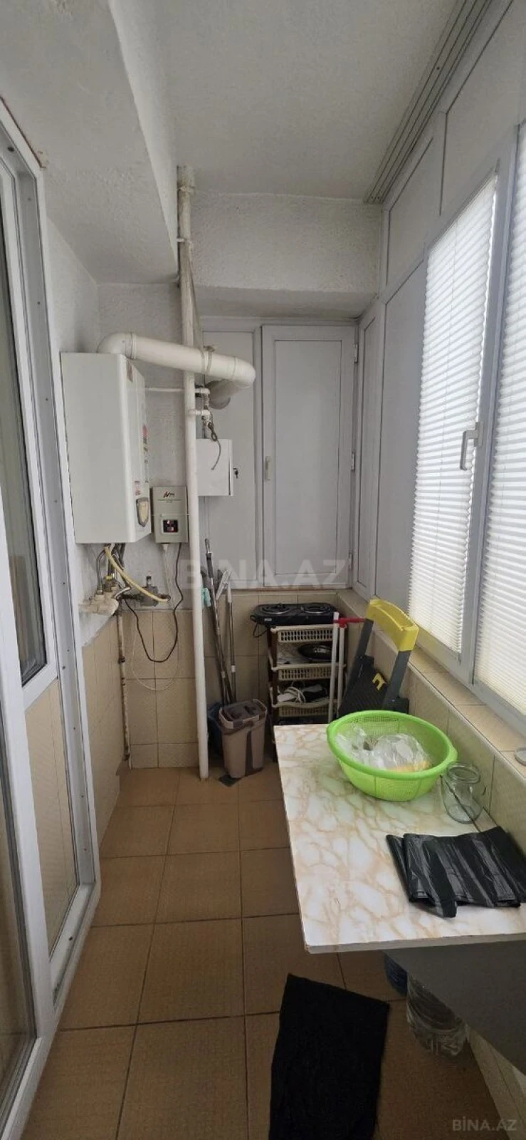 Satılır 4 otaqlı mənzil 131 m²