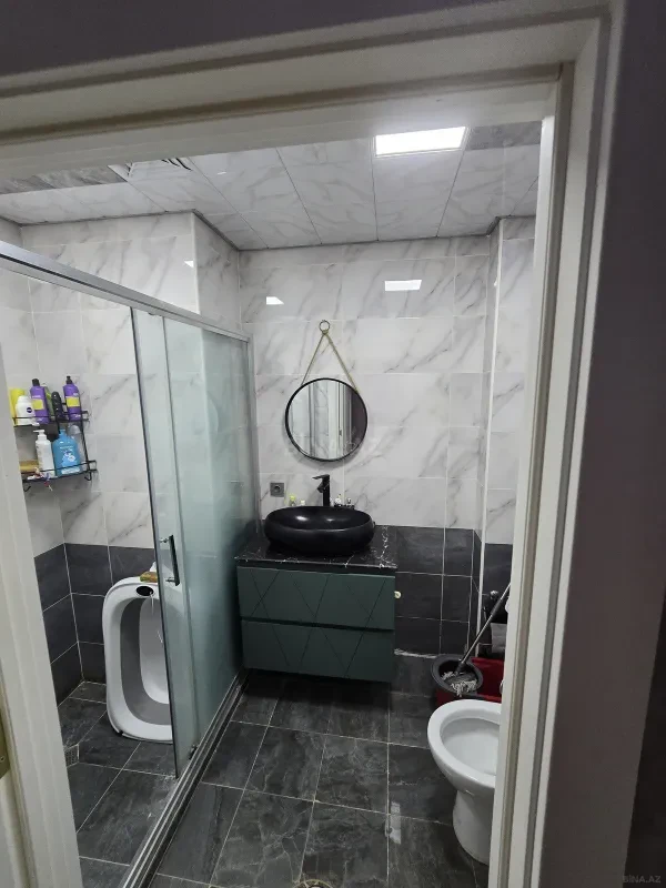 Satılır 4 otaqlı mənzil 115 m²