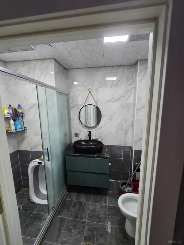 Satılır 4 otaqlı mənzil 115 m²