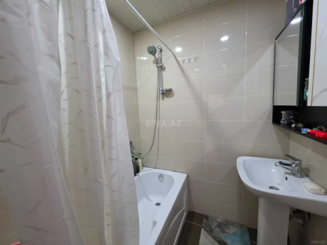 Satılır 4 otaqlı mənzil 112 m²