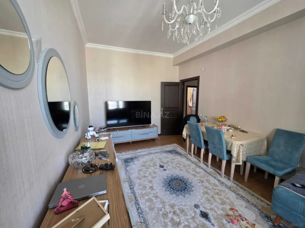 Satılır 4 otaqlı mənzil 112 m²