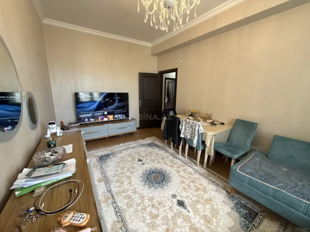 Satılır 4 otaqlı mənzil 115 m²