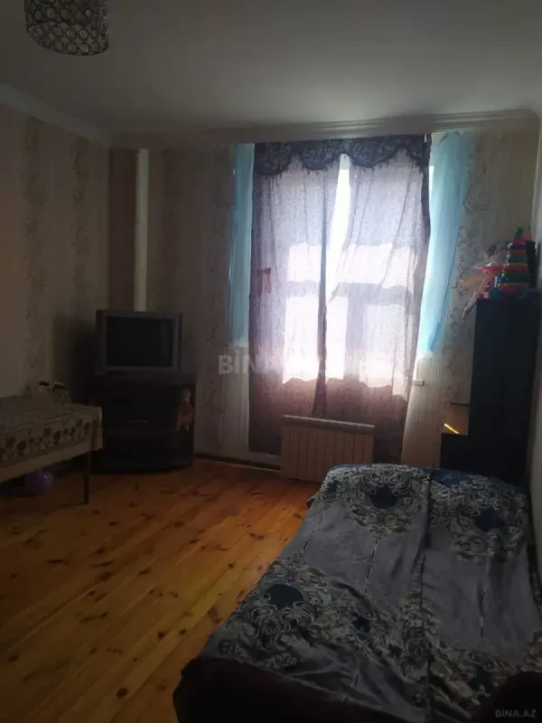 Satılır 2 otaqlı mənzil 57.4 m²
