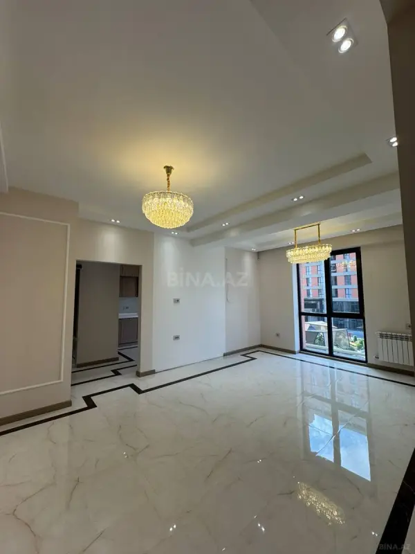 Satılır 4 otaqlı mənzil 129 m²