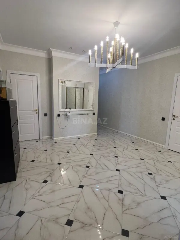 Satılır 3 otaqlı mənzil 118 m²