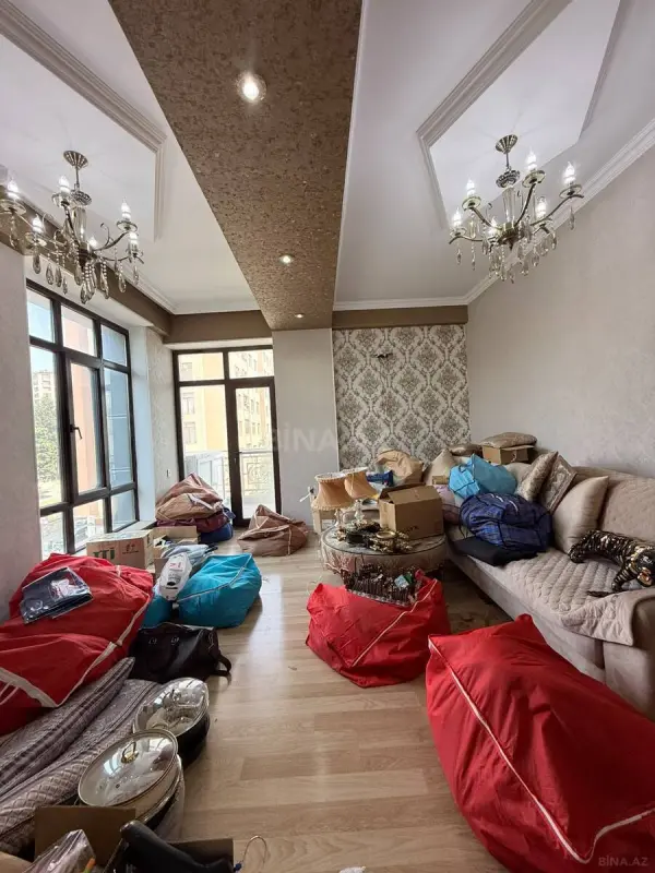 Satılır 4 otaqlı mənzil 128 m²