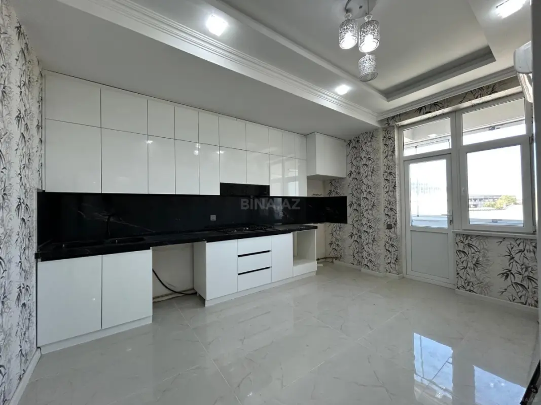 Satılır 4 otaqlı mənzil 165 m²