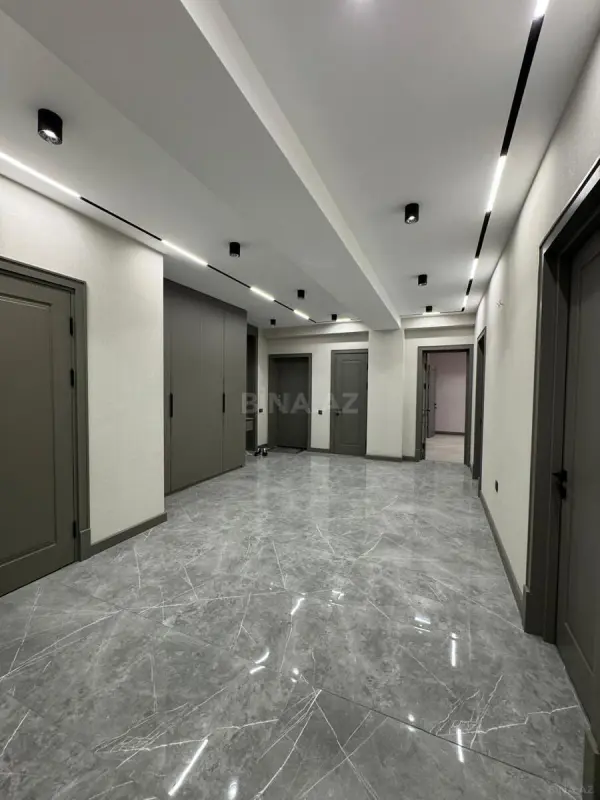 Satılır 4 otaqlı mənzil 165 m²