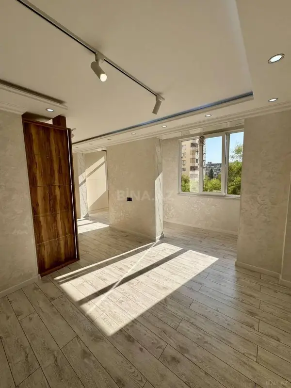 Satılır 4 otaqlı mənzil 125 m²