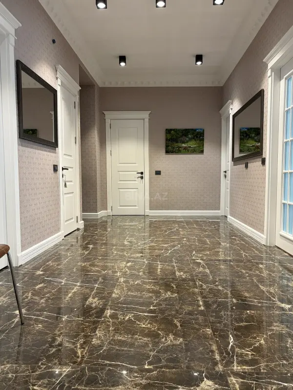 Satılır 4 otaqlı mənzil 145 m²