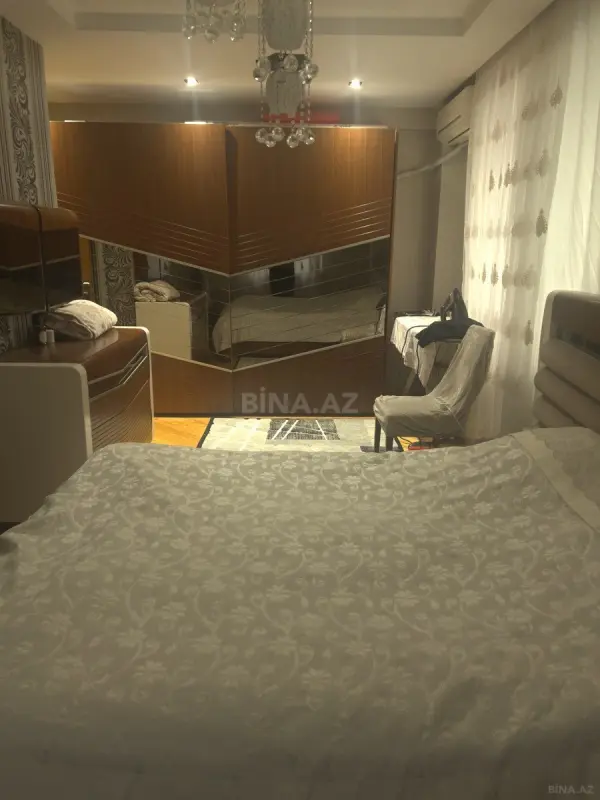 Satılır 4 otaqlı mənzil 128 m²