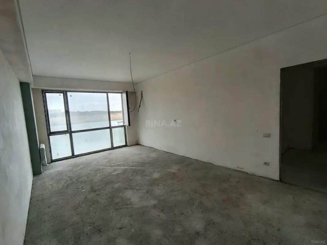 Satılır 4 otaqlı mənzil 121.2 m²