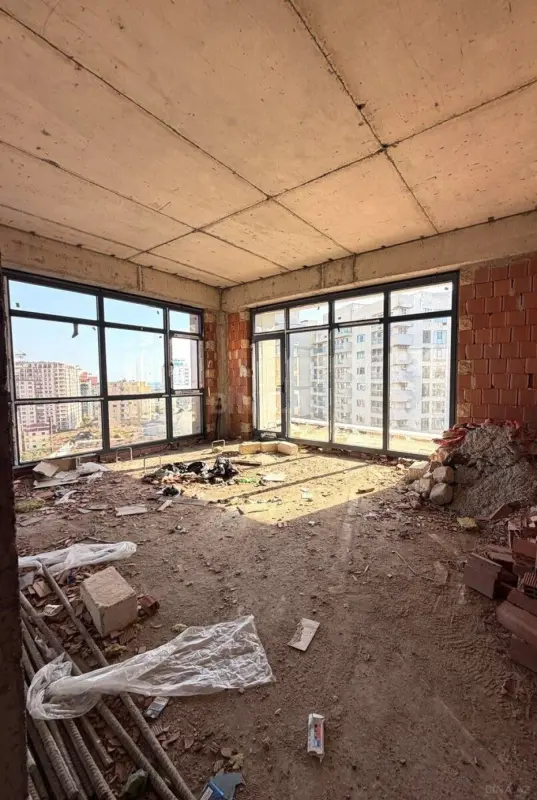 Satılır 4 otaqlı mənzil 133 m²