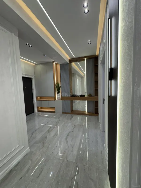 Satılır 4 otaqlı mənzil 142 m²