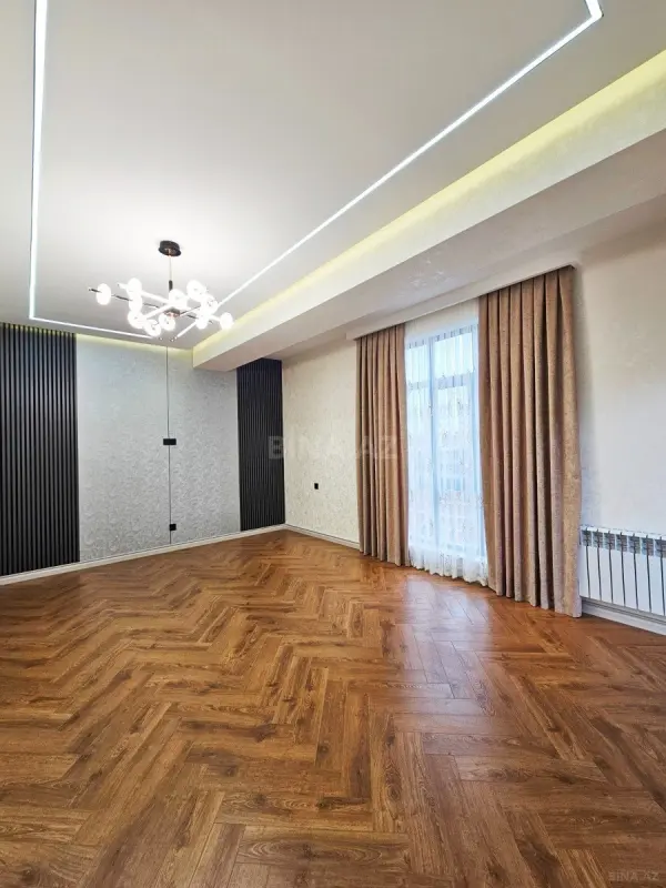 Satılır 4 otaqlı mənzil 127 m²