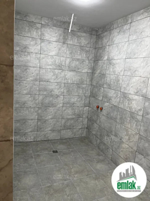 Satılır 4 otaqlı mənzil 140 m²