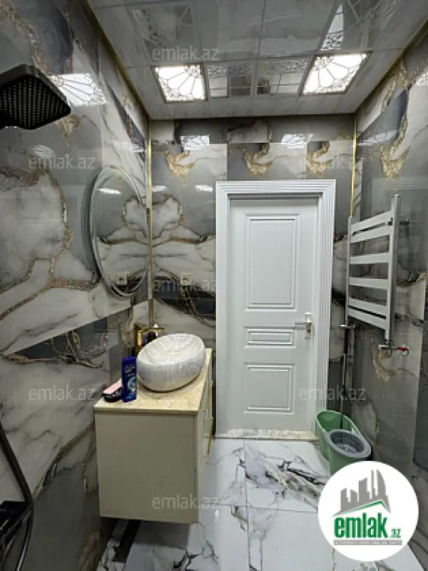 Satılır 3 otaqlı yeni tikili 100 m²