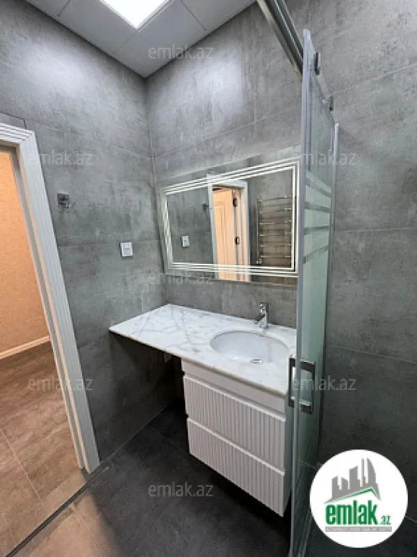 Satılır 2 otaqlı yeni tikili 60 m²