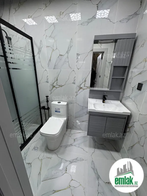 Satılır 4 otaqlı mənzil 130 m²