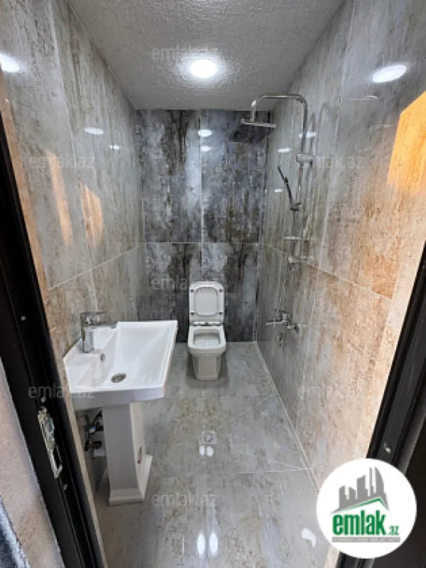 Satılır 4 otaqlı mənzil 130 m²