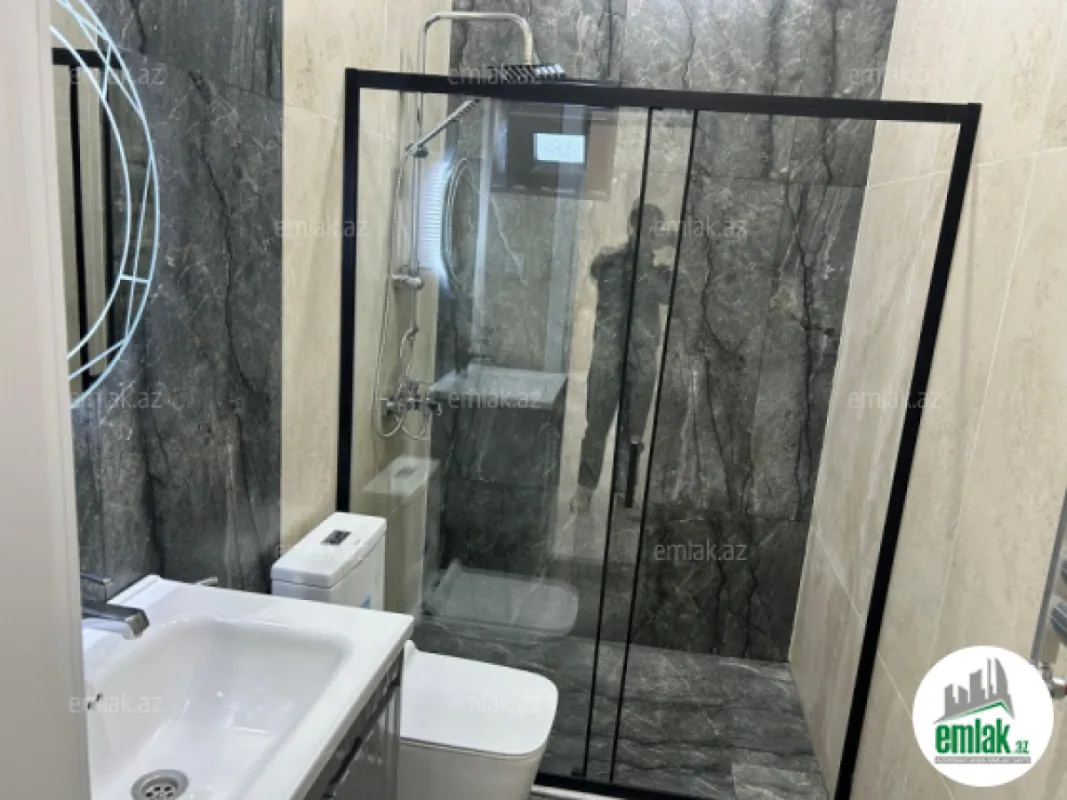 Satılır 4 otaqlı mənzil 140 m²