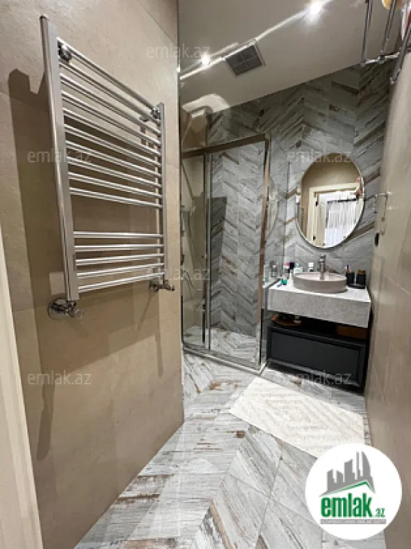 Satılır 4 otaqlı yeni tikili 140 m²