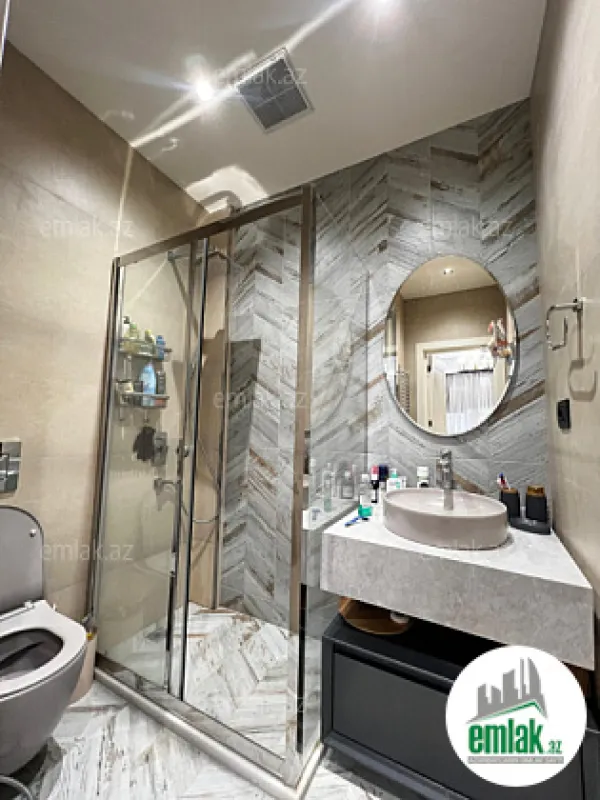 Satılır 4 otaqlı yeni tikili 140 m²