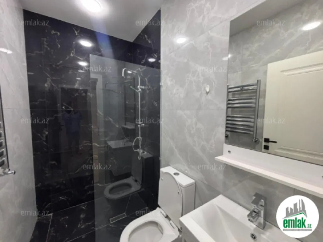 Satılır 4 otaqlı mənzil 150 m²