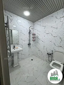 Satılır 2 otaqlı yeni tikili 60 m²