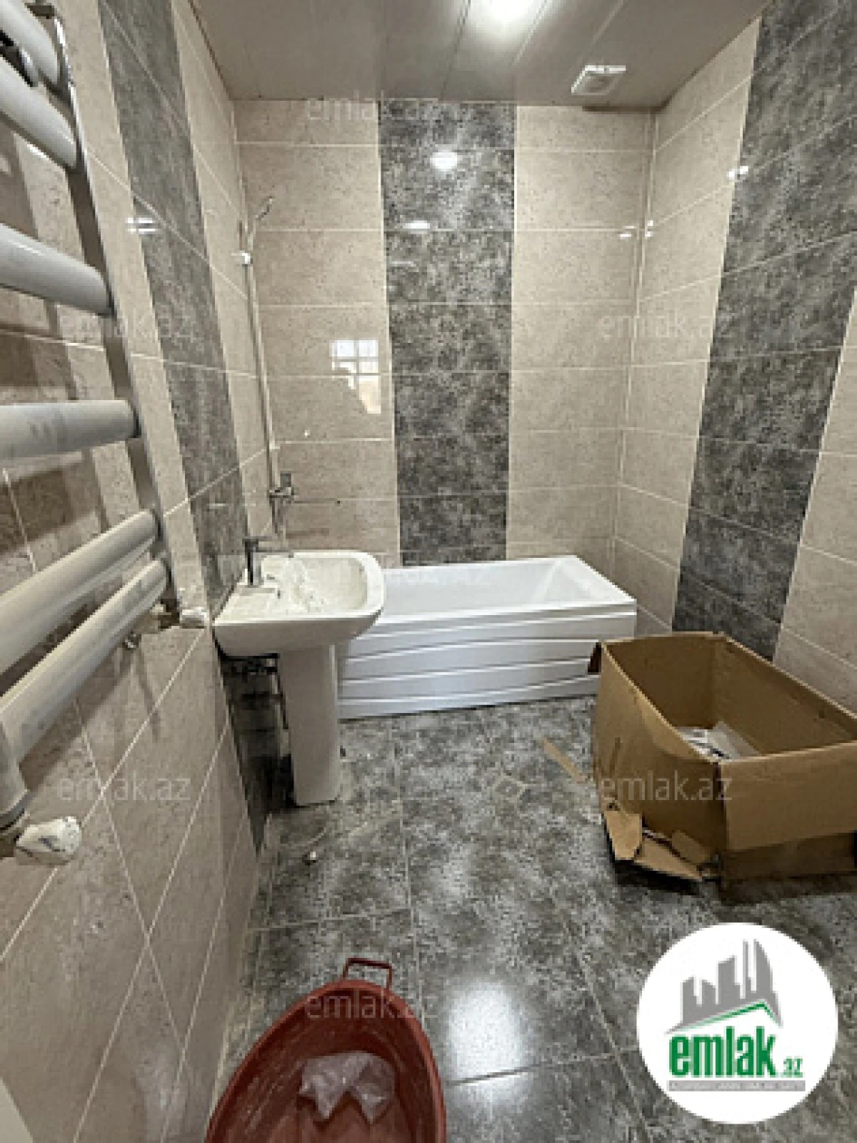 Satılır 3 otaqlı yeni tikili 100 m²